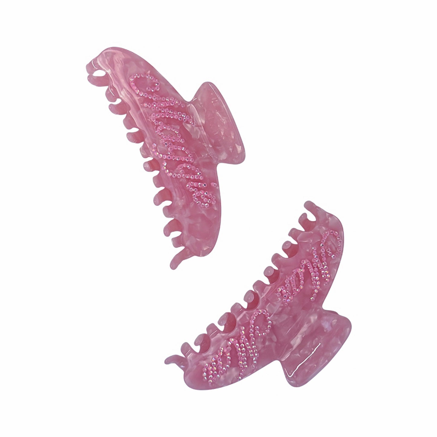 The iconic OG Claw just got a glow-up. This pink marbled hair clip features your custom name or phrase hand-set in sparkling rhinestones—making it the ultimate glam gift for bachelorettes, bridesmaids, birthdays, or just treating yourself. Strong hold meets standout style with this personalized claw clip designed to turn heads and stay put. Made to order and made to shine, the OG Claw is your new must-have hair essential.