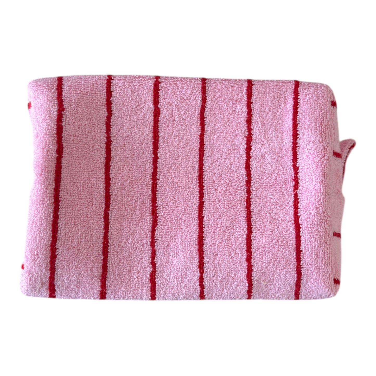 Pink towel with red stripes on a white background