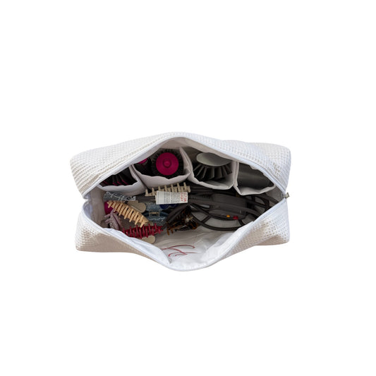 White and pink embroidered blowout pouches for hot tools and hair essentials, customizable with your name — from Local Love by Lauren.