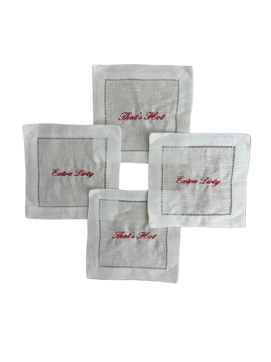 Upgrade your bar cart with The Flirty Cocktail Set – pre-embroidered linen cocktail napkins with cheeky sayings. Perfect hostess gift or party accessory.