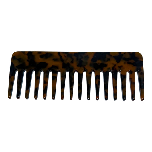 Tortoise shell-patterned wide tooth comb with a smooth, curved edge and glossy finish, personalized to order.

