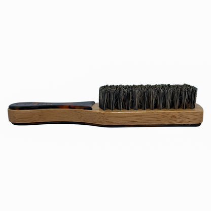 The Slick Back Brush – handcrafted wooden brush with boar head bristles, designed for maximum hold and smooth, sculpted hairstyles.